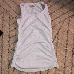 Light blue Athleta tank top. Ruched sides. Lots of stretch. New condition.